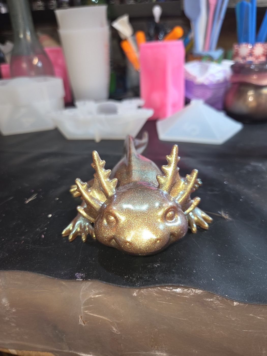 Shimmery gold resin axolotl