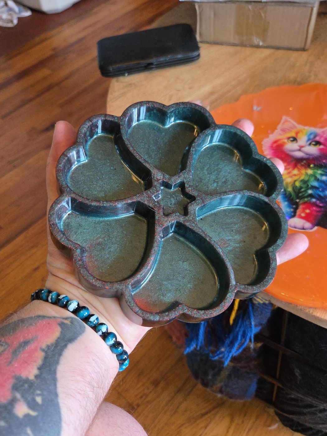 Deep teal flower-shaped compartment dish